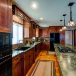 Arts-&-Crafts-Kitchen-with-tropical-green-granite