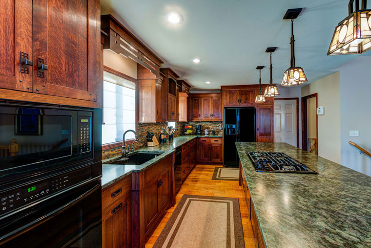 Arts-&-Crafts-Kitchen-with-tropical-green-granite